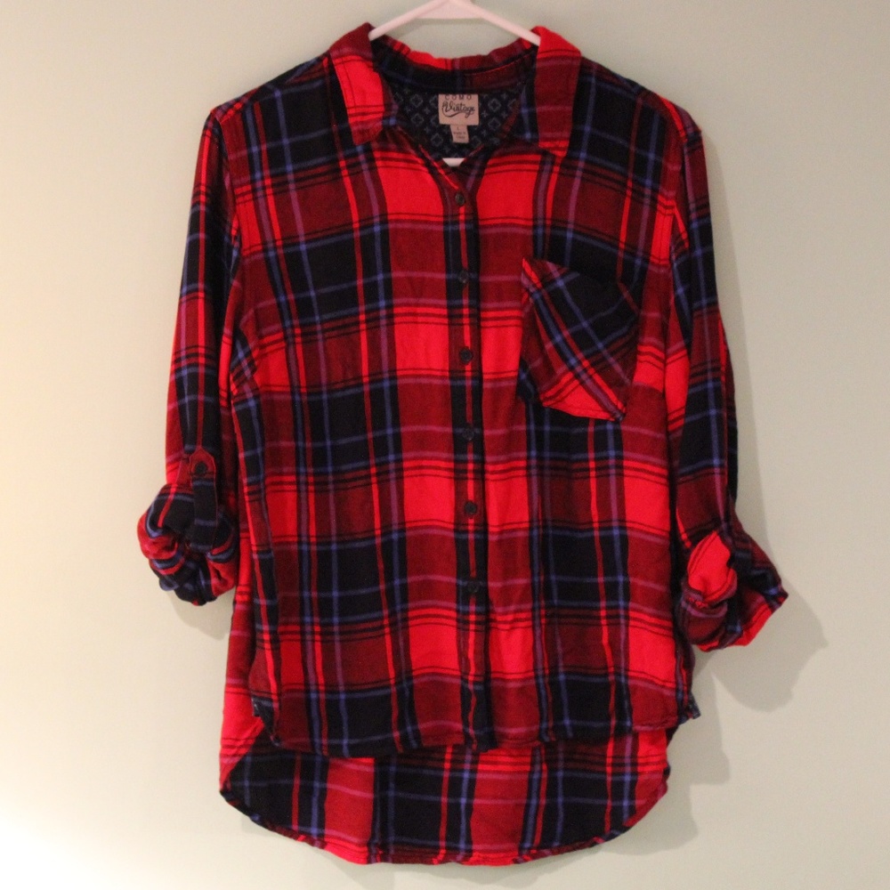 Red, black, and blue plaid collared shirt
